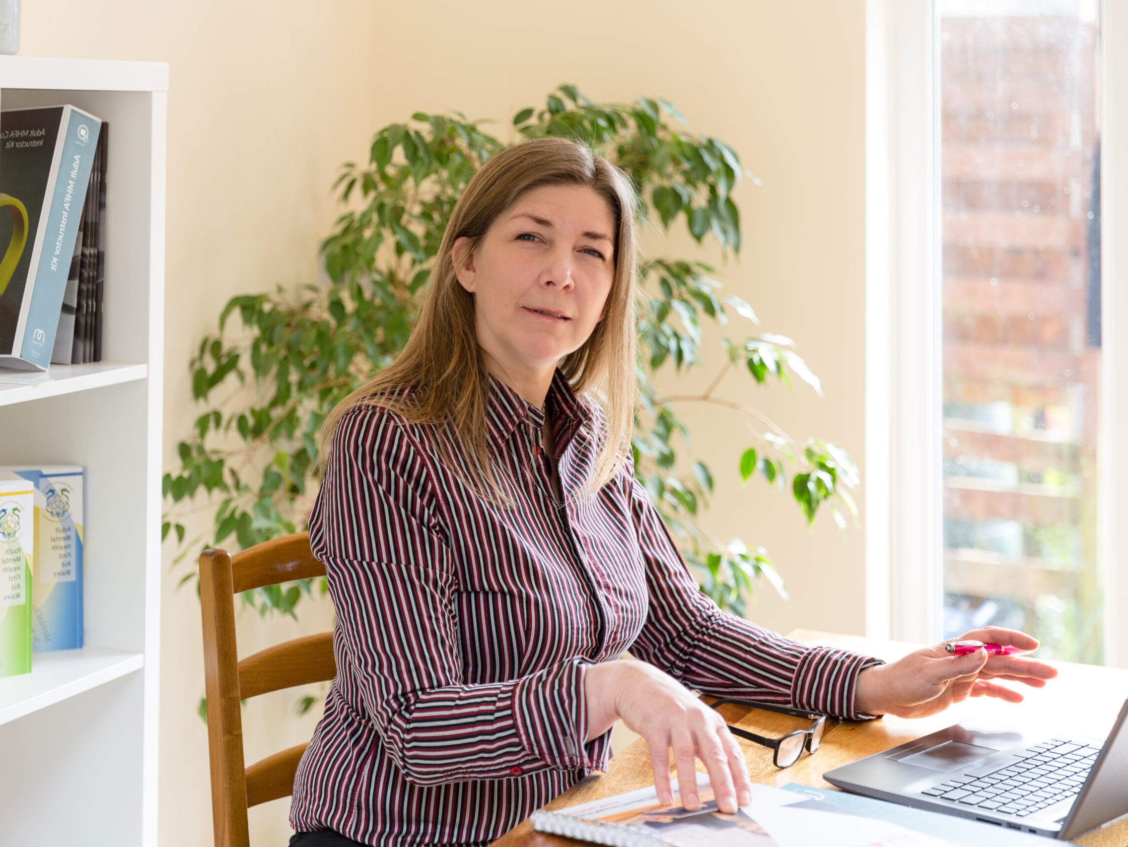 Ellender Wildey at her desk